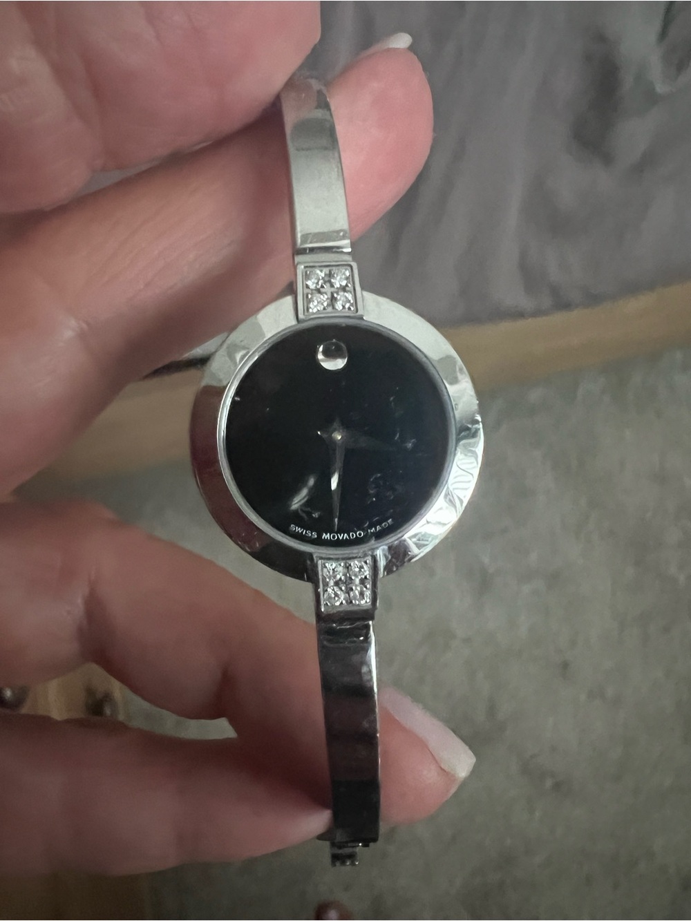 Movado Silver Bangle Watch with Black Dial and Crystal Details